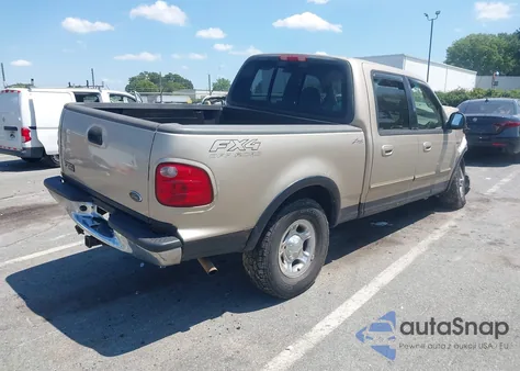 2001 Ford F-150 King Ranch Edition/Lariat/Xlt z USA, uszkodzony, nr VIN 1FTRW08L31KD87783